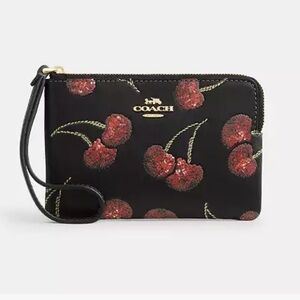 Coach Black Wristlet with Red Cherry Design